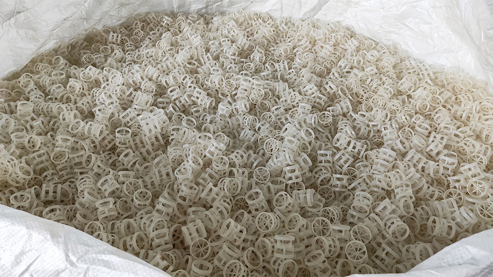 Plastic Pall Rings installed in an acid gas scrubber tower for HCl and SO2 absorption