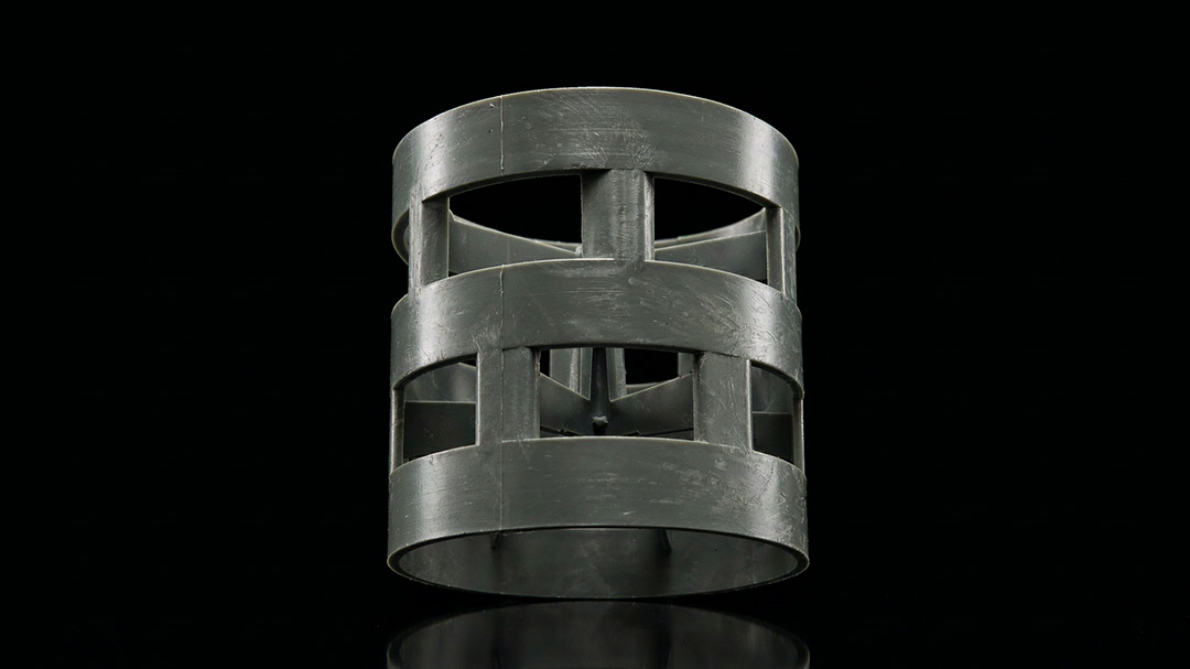 Macro close-up of CPVC and PP packing side walls showing wall thickness and extrusion grain